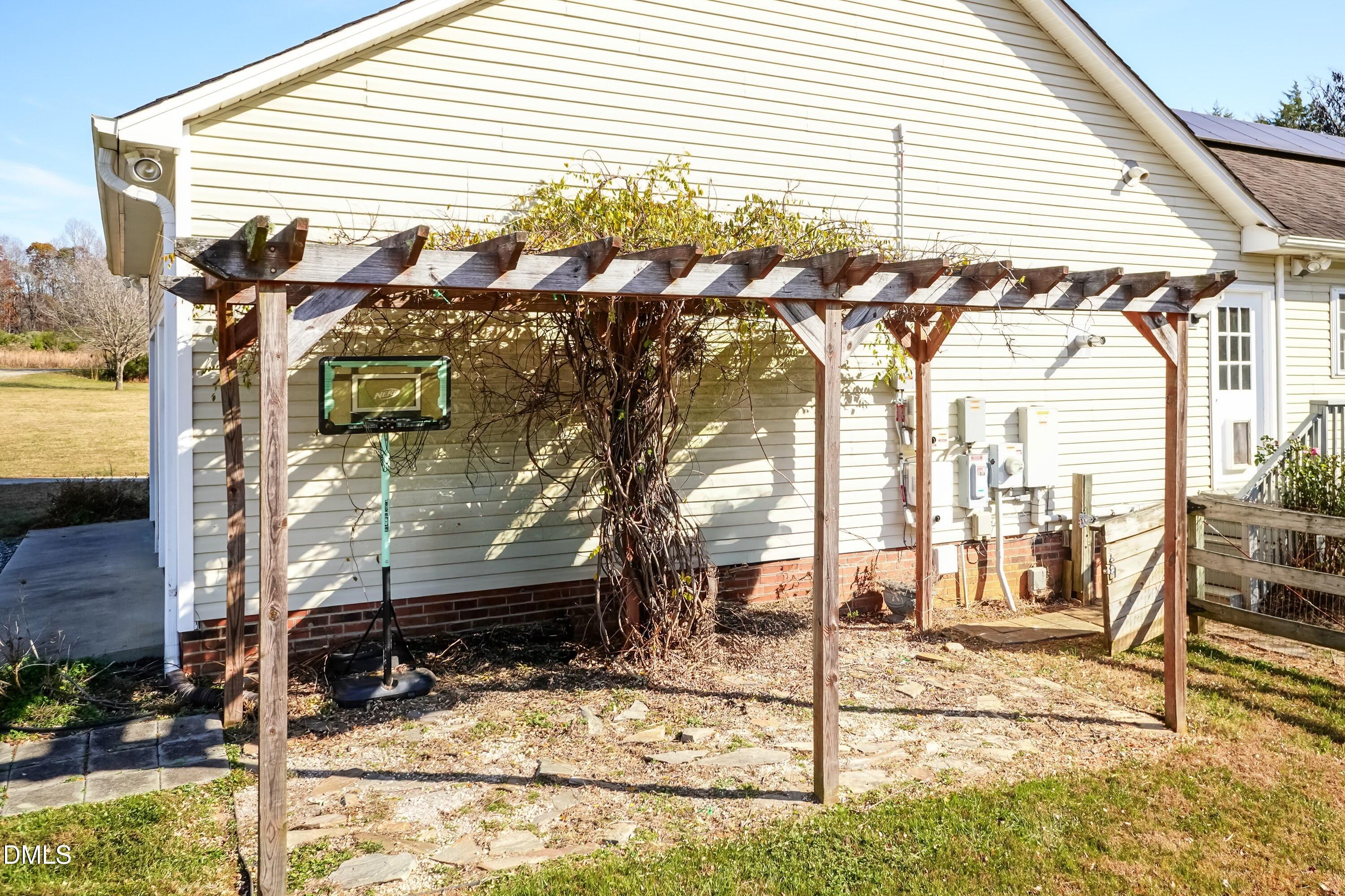 1722 Saddle Club Road Mebane, NC 27302 - Photo 35 of 37 a view of a house with snow on the road