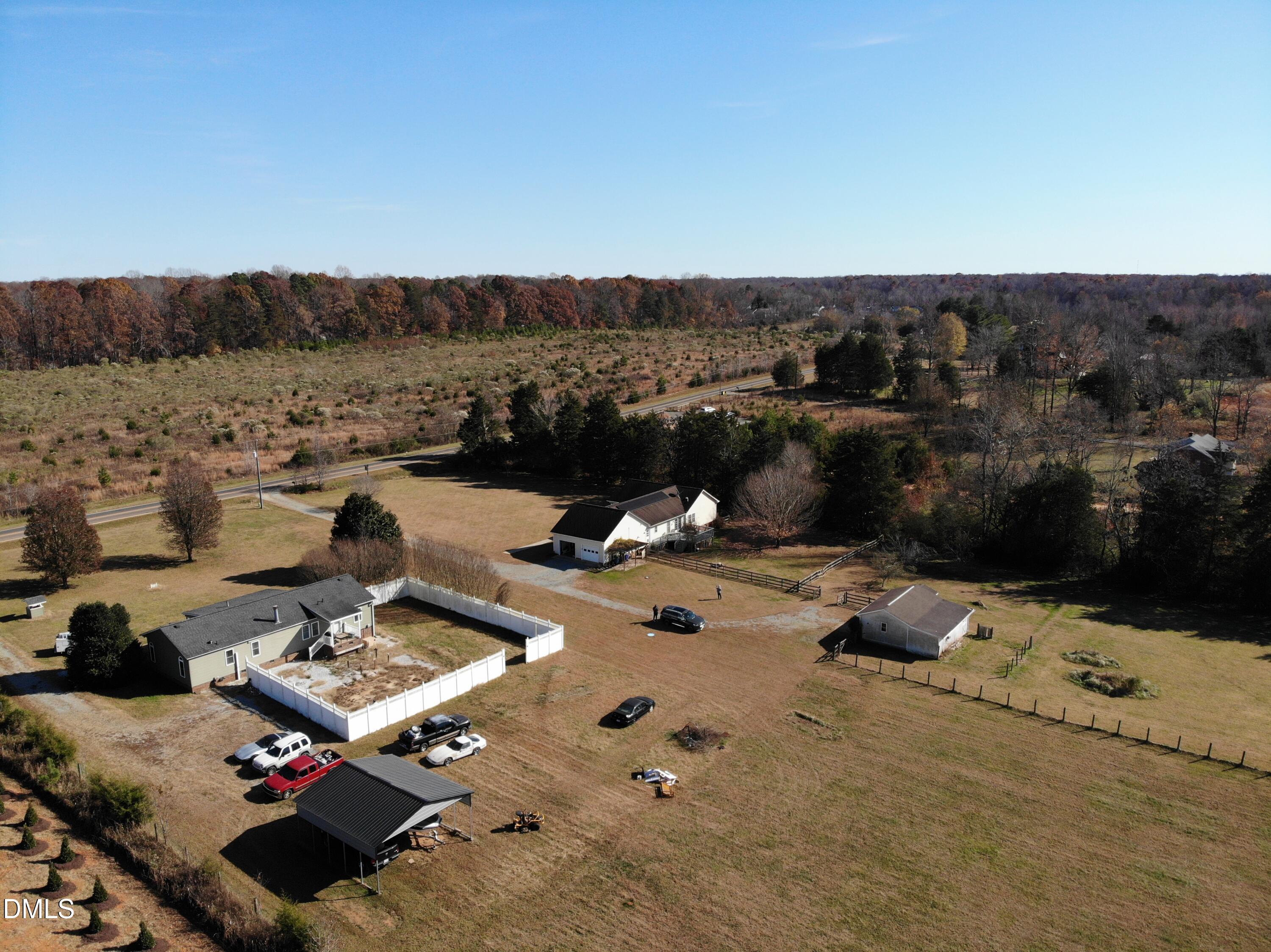 1722 Saddle Club Road Mebane, NC 27302 - Photo 36 of 37 an aerial view of a couch with wooden fence
