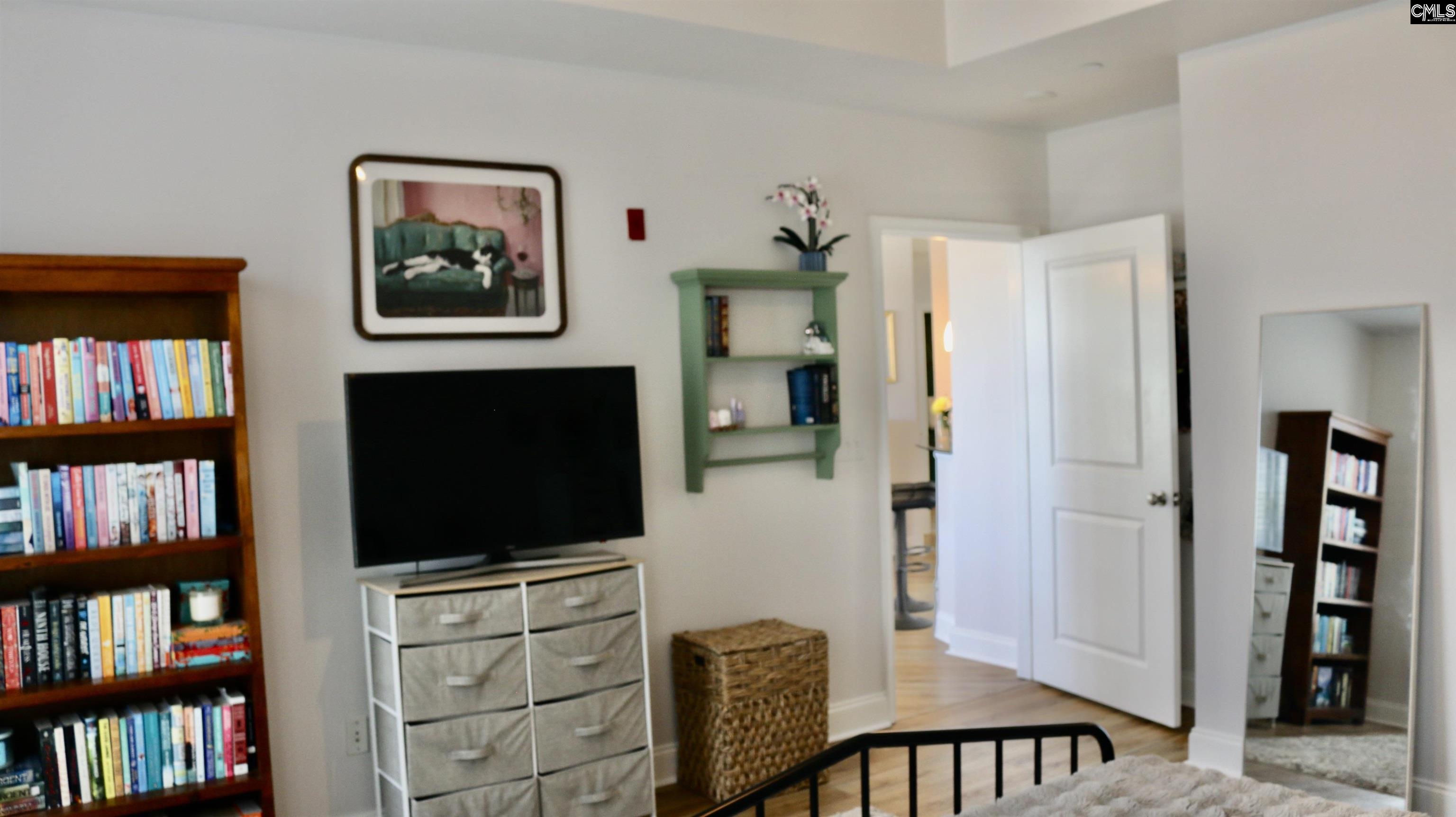 601 Main Street, Unit 323 Columbia, SC 29201 - Photo 32 of 68 a view of a livingroom with furniture and a flat screen tv