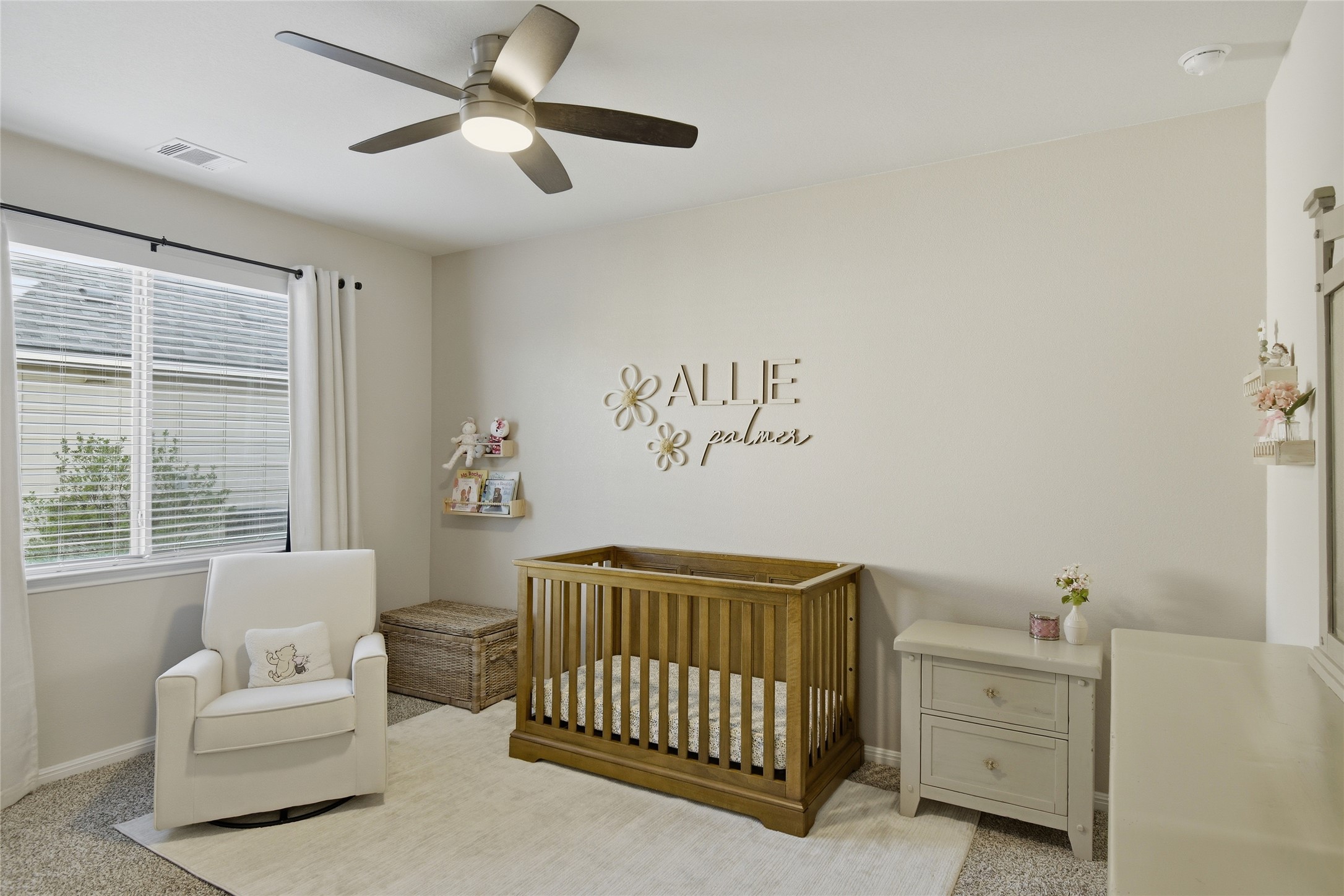 8152 Daisy Cutter Crossing Georgetown, TX 78626 - Photo 12 of 23 a bedroom with a baby bed couch and a window