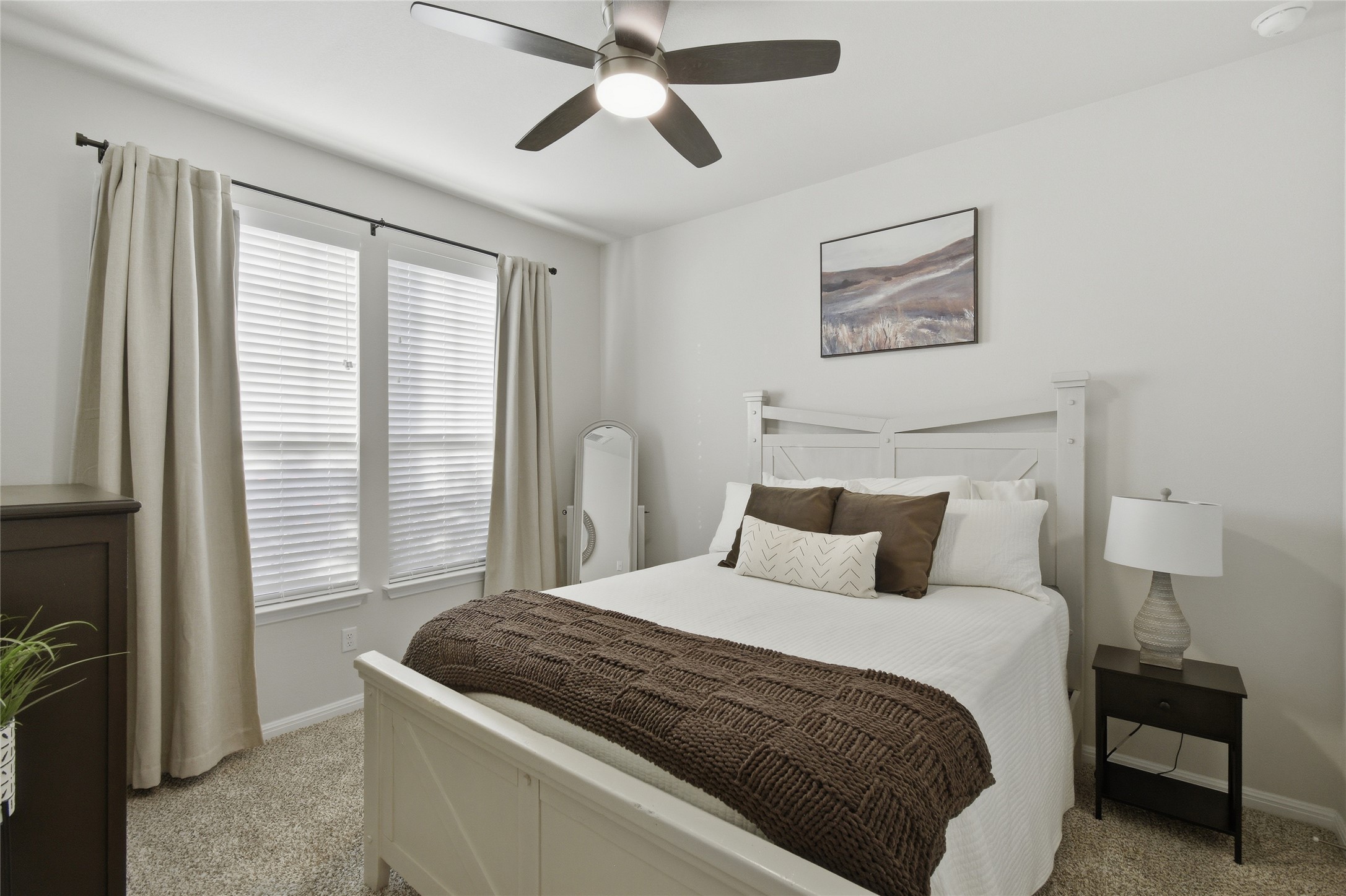 8152 Daisy Cutter Crossing Georgetown, TX 78626 - Photo 13 of 23 a bedroom with a large bed and a window
