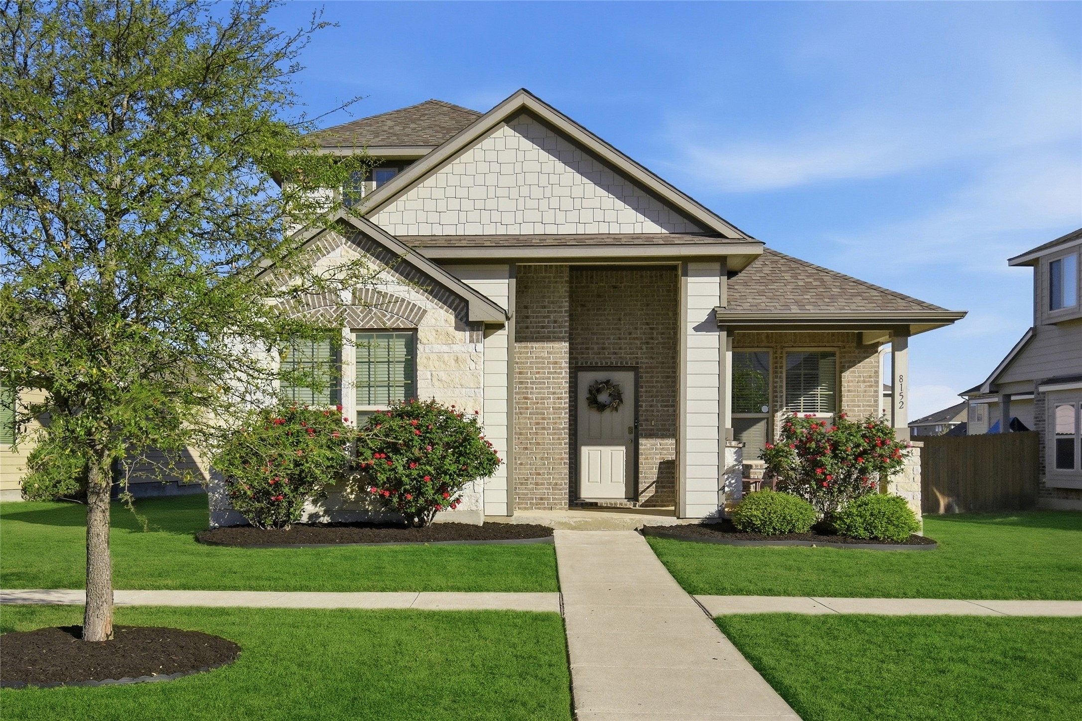 8152 Daisy Cutter Crossing Georgetown, TX 78626 - Photo 19 of 23 a front view of a house with a yard