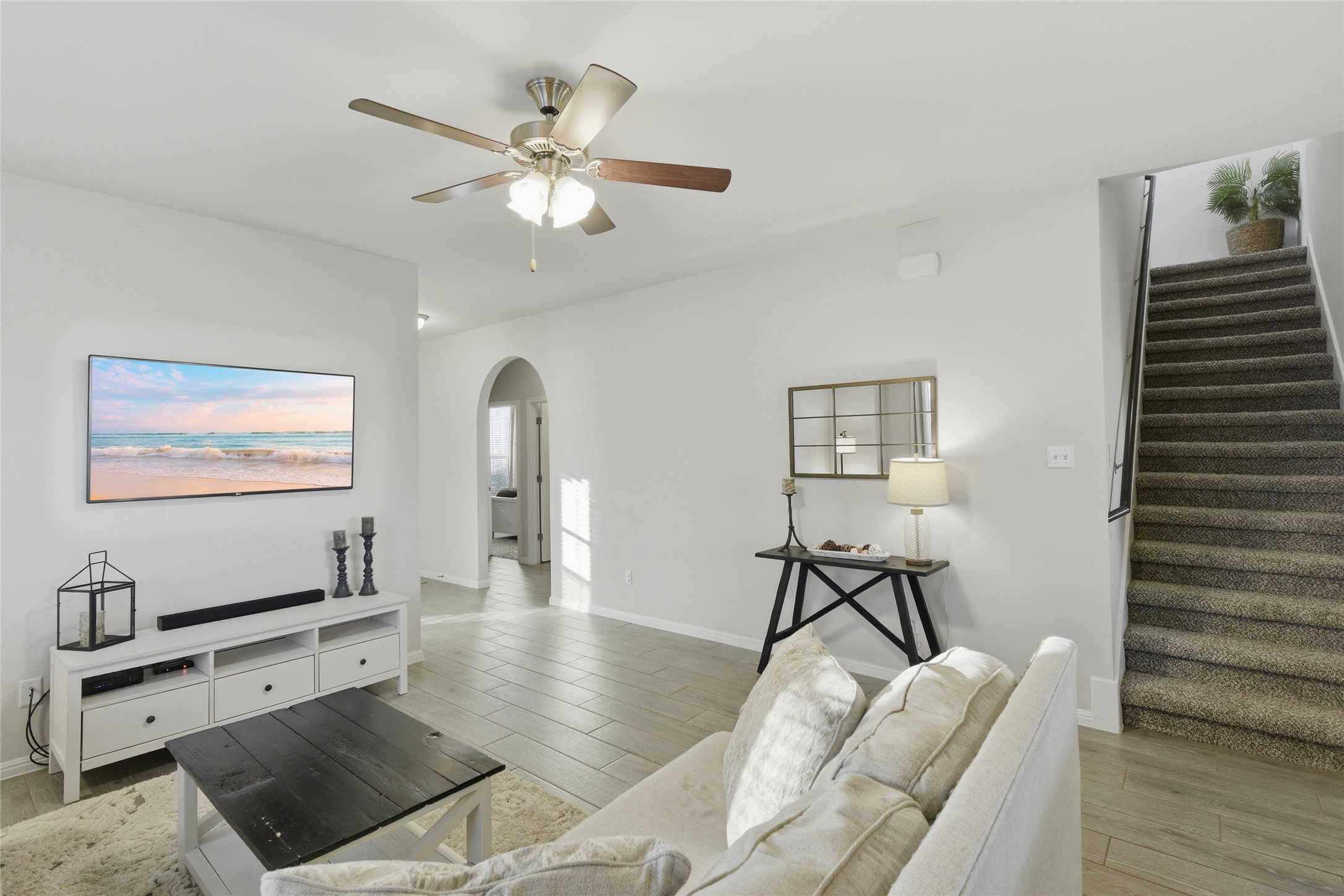 8152 Daisy Cutter Crossing Georgetown, TX 78626 - Photo 2 of 23 a work room with furniture and wooden floor