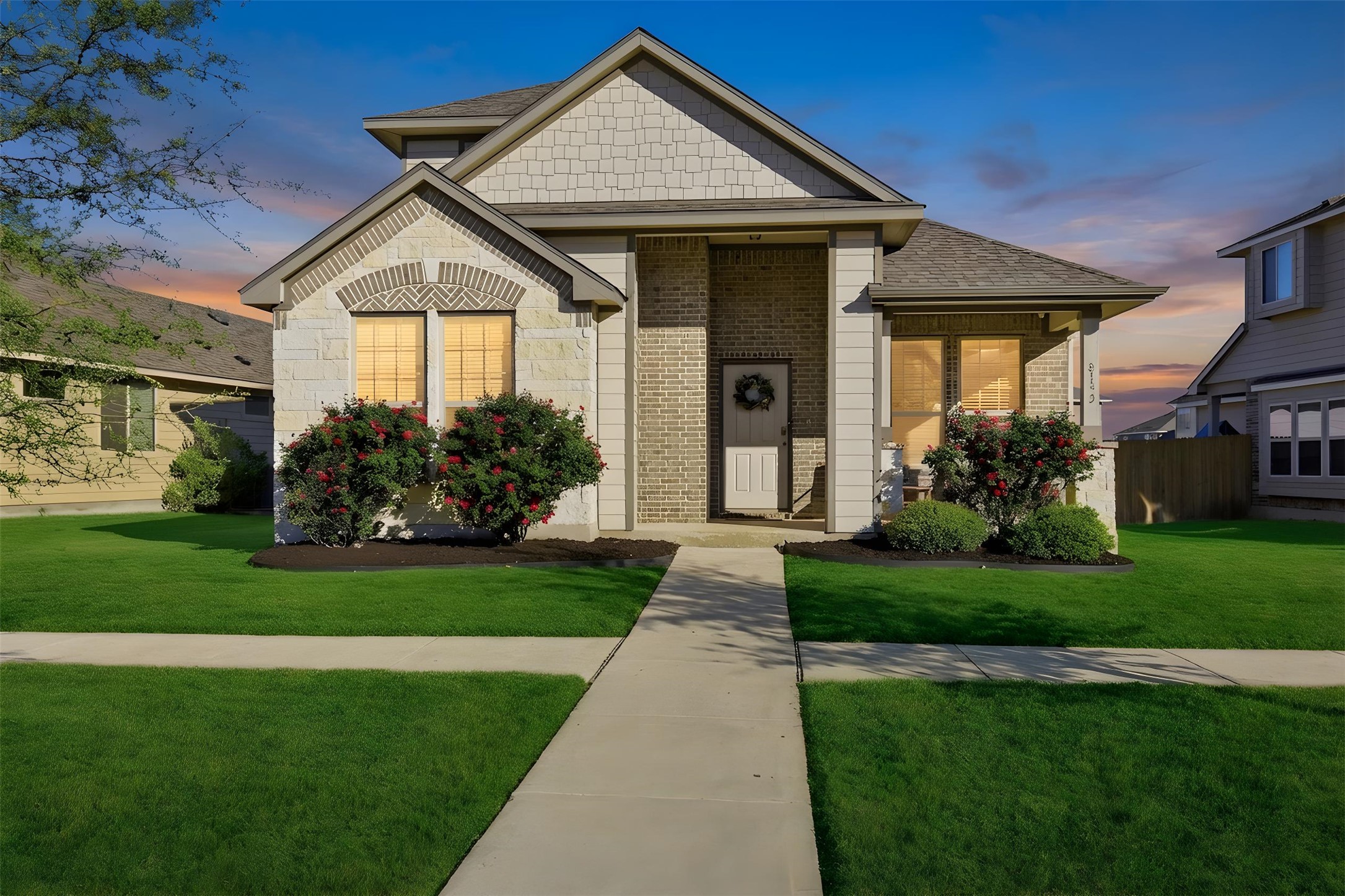 8152 Daisy Cutter Crossing Georgetown, TX 78626 - Photo 3 of 23 a front view of a house with a yard