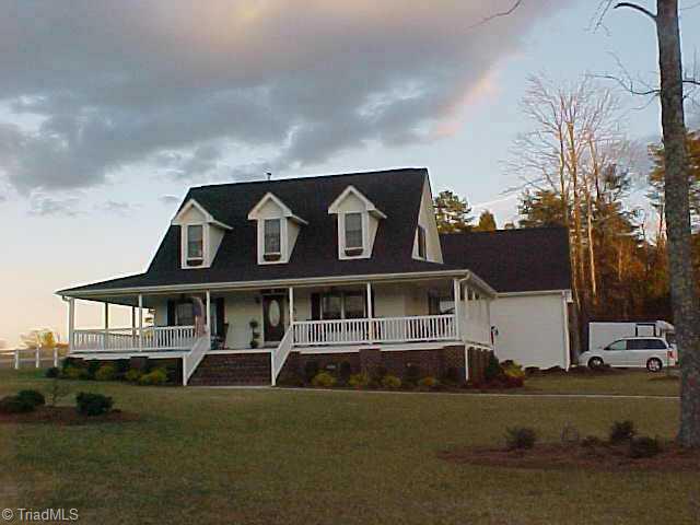 2814 Lockland Drive Oak Ridge, NC 27310 - Photo 1 of 9 Exterior Front.