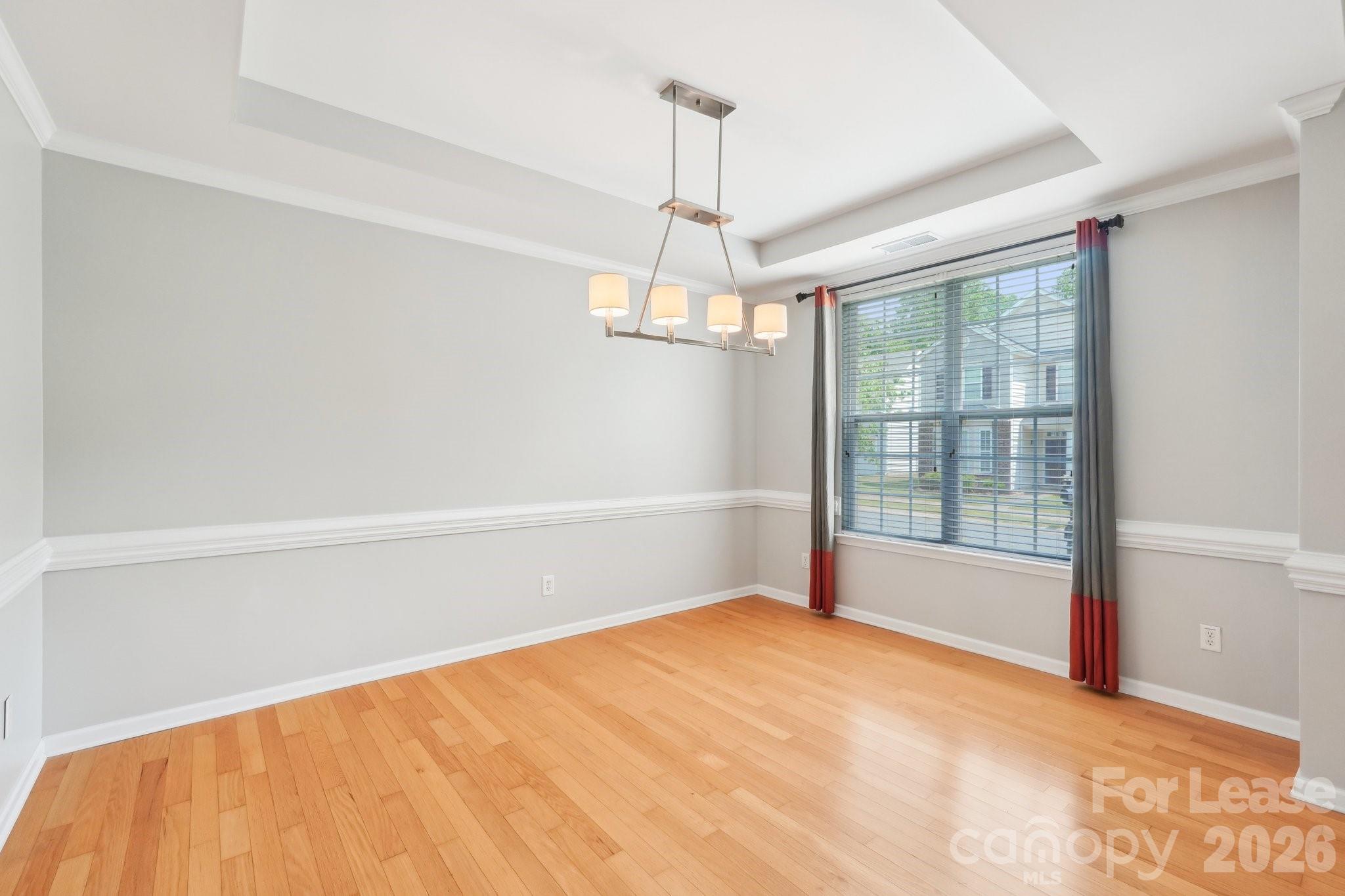 14417 Laurel Tree Lane Huntersville, NC 28078 - Photo 16 of 48 a view of an empty room with a window