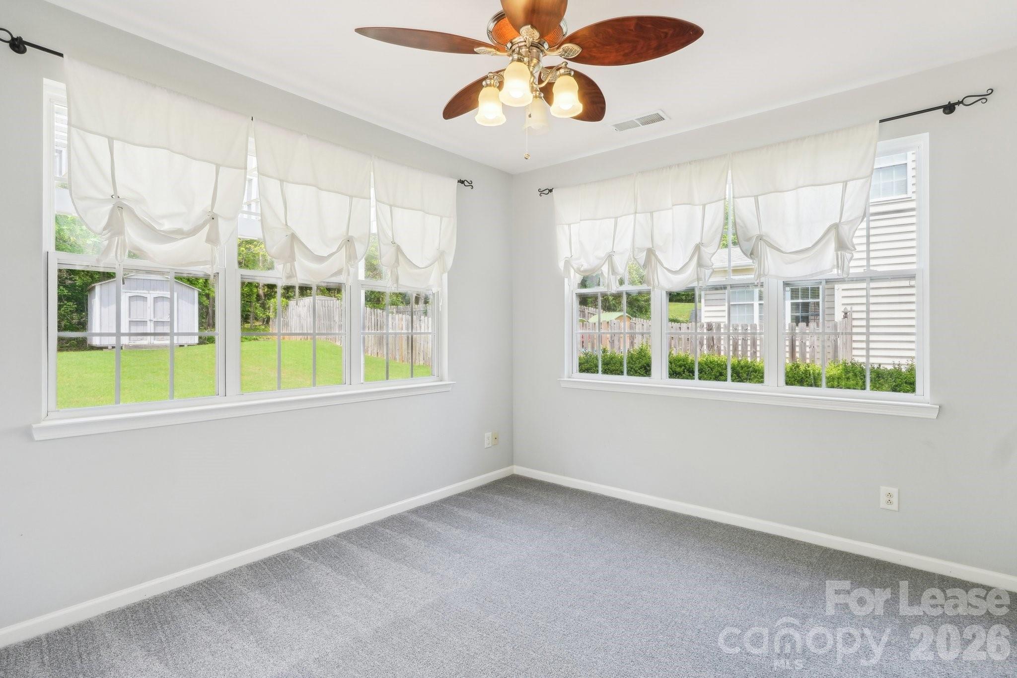 14417 Laurel Tree Lane Huntersville, NC 28078 - Photo 22 of 48 a view of an empty room with a window