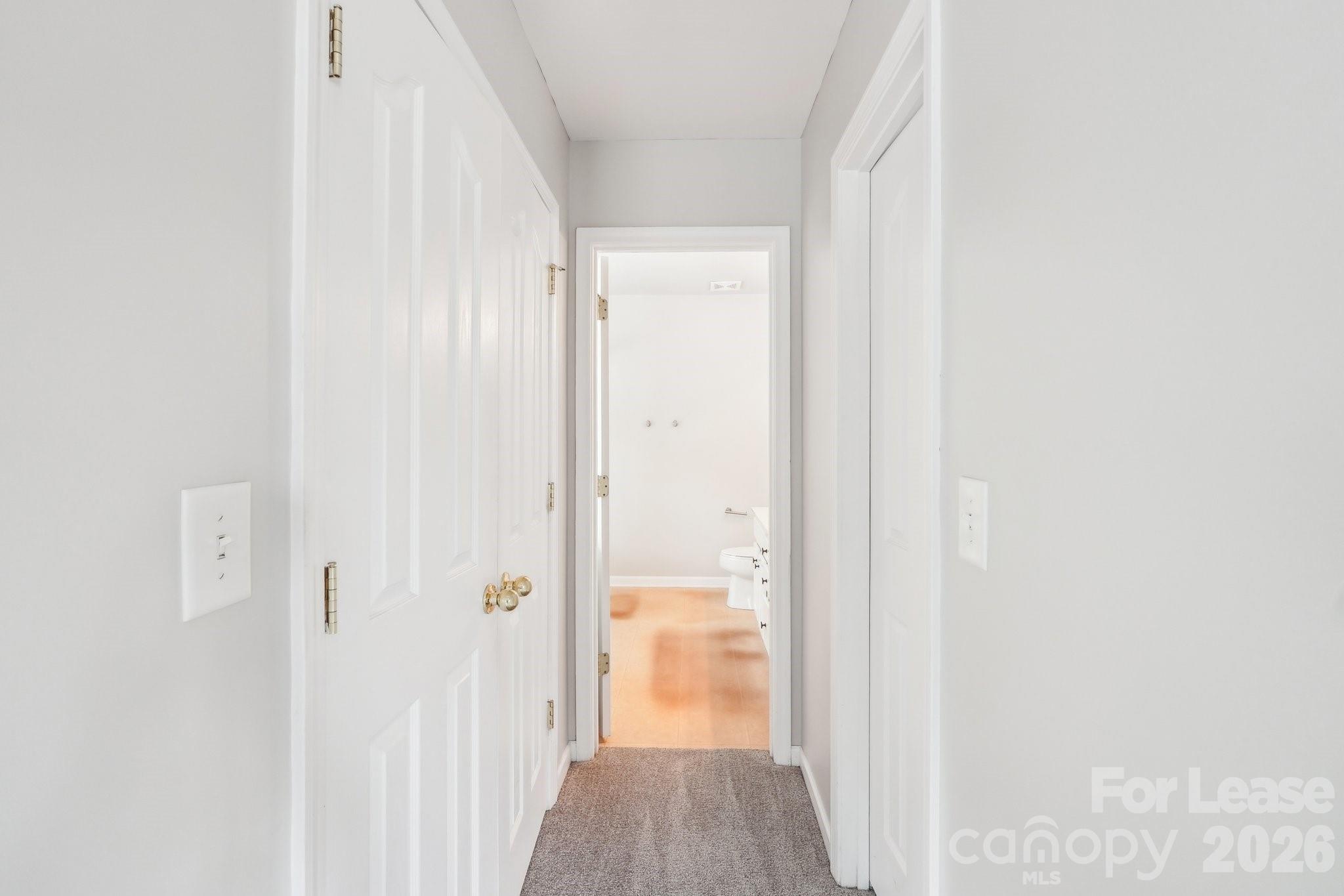 14417 Laurel Tree Lane Huntersville, NC 28078 - Photo 27 of 48 a view of a bathroom from a hallway