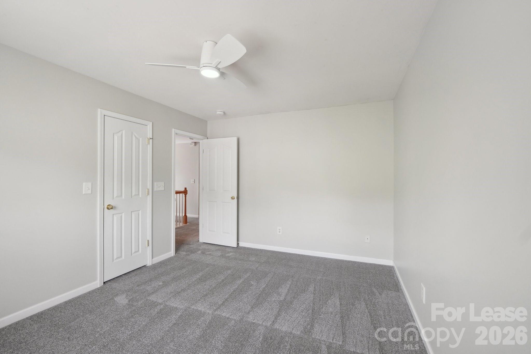 14417 Laurel Tree Lane Huntersville, NC 28078 - Photo 31 of 48 a view of an empty room