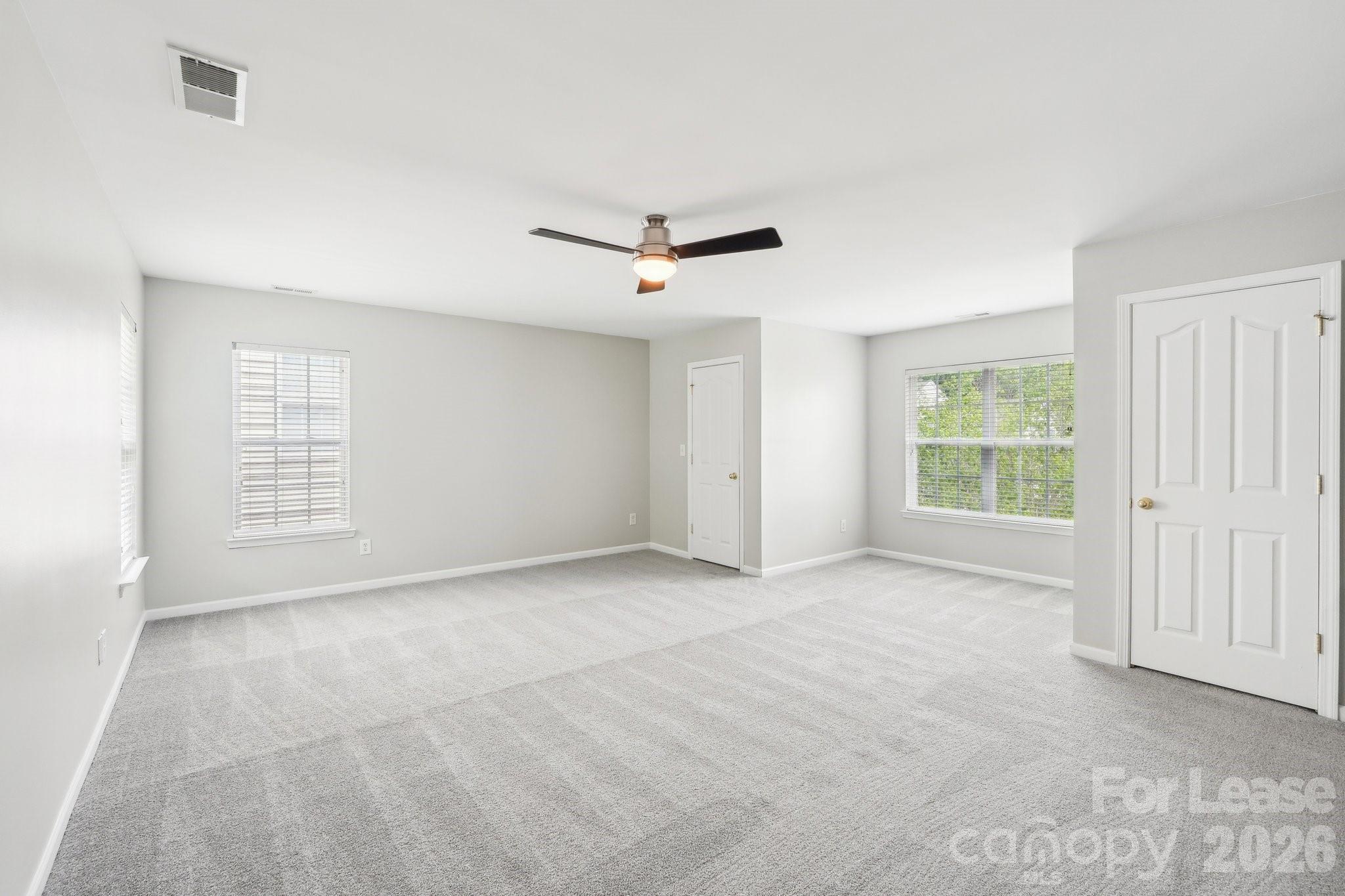 14417 Laurel Tree Lane Huntersville, NC 28078 - Photo 33 of 48 a view of an empty room with a window