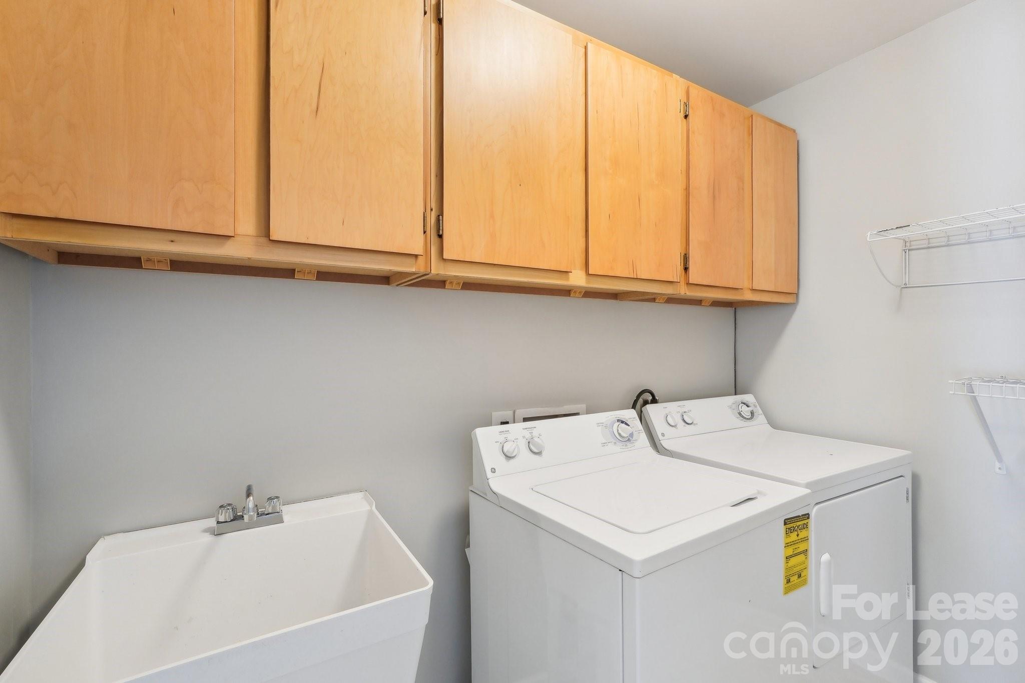 14417 Laurel Tree Lane Huntersville, NC 28078 - Photo 42 of 48 a utility room with dryer and washer
