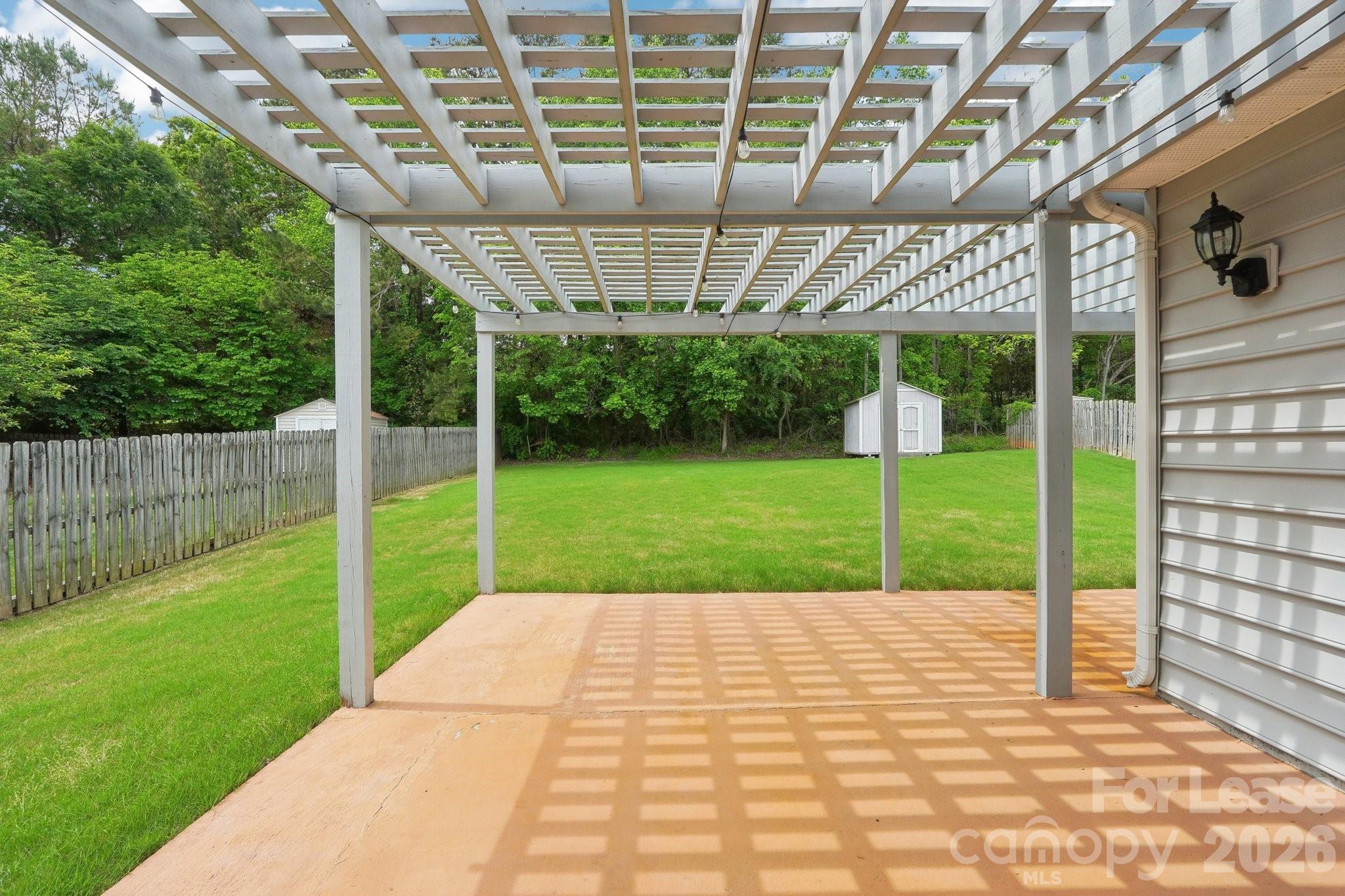 14417 Laurel Tree Lane Huntersville, NC 28078 - Photo 44 of 48 a view of a porch with a backyard