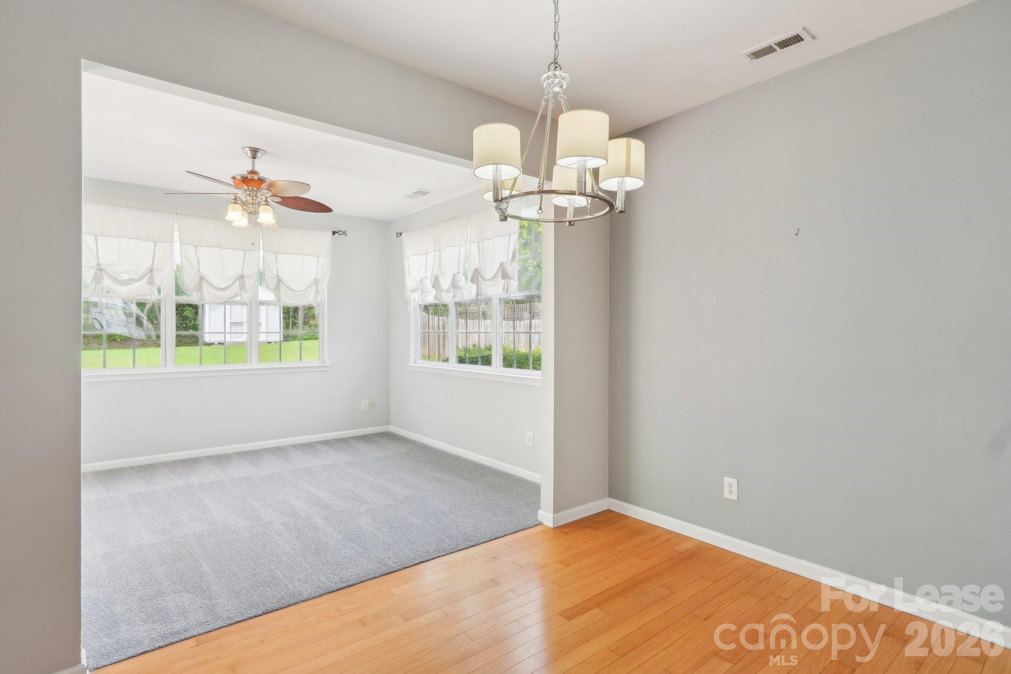 14417 Laurel Tree Lane Huntersville, NC 28078 - Photo 9 of 48 a view of an empty room with a window