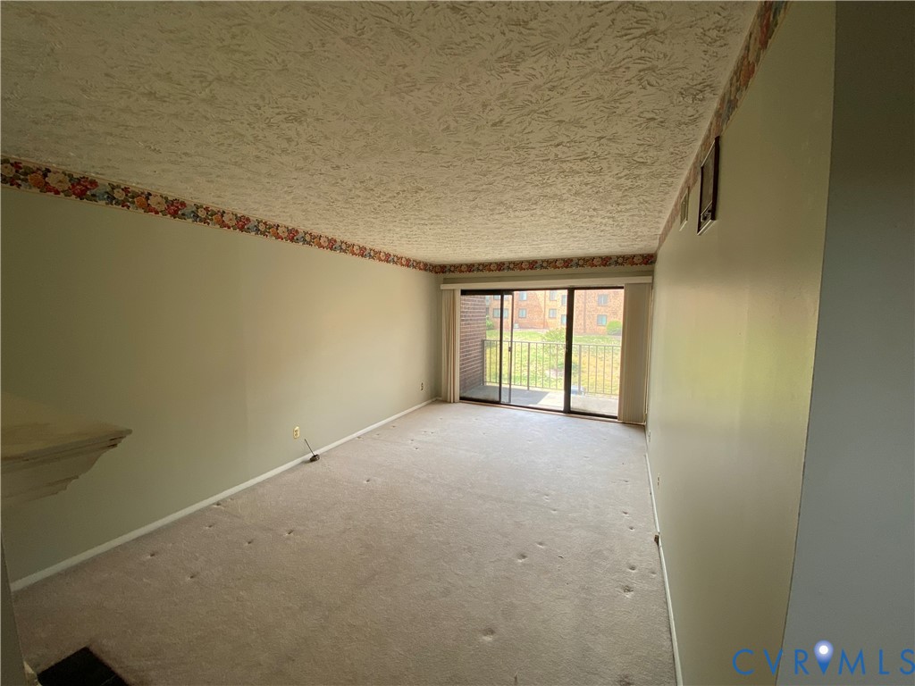 1507 Bronwyn Road, Unit 301 Henrico, VA 23238 - Photo 6 of 41 a view of an empty room with a window