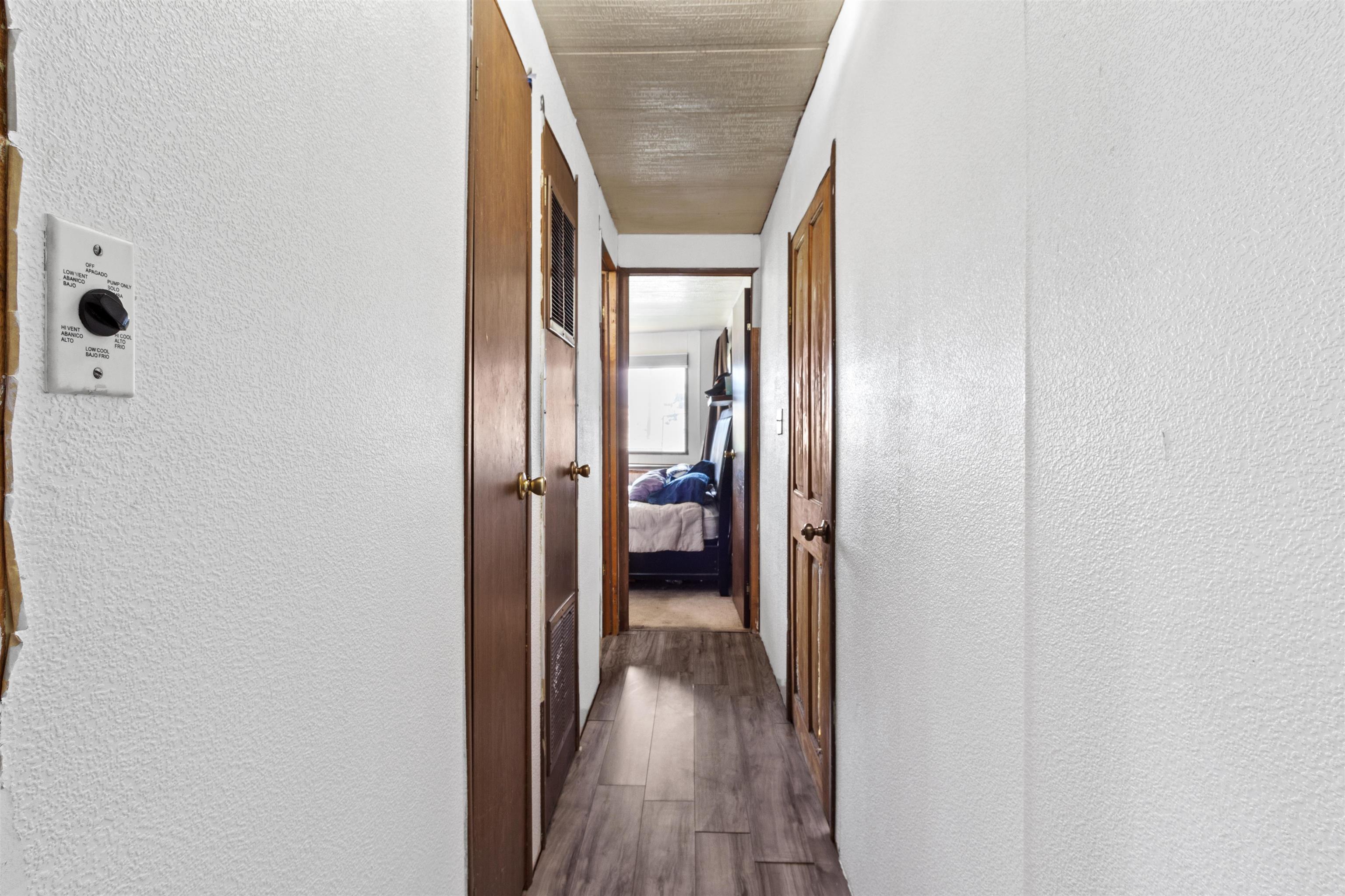 424 32 Road, Unit 262 Clifton, CO 81520 - Photo 12 of 16 a view of a hallway with wooden floor
