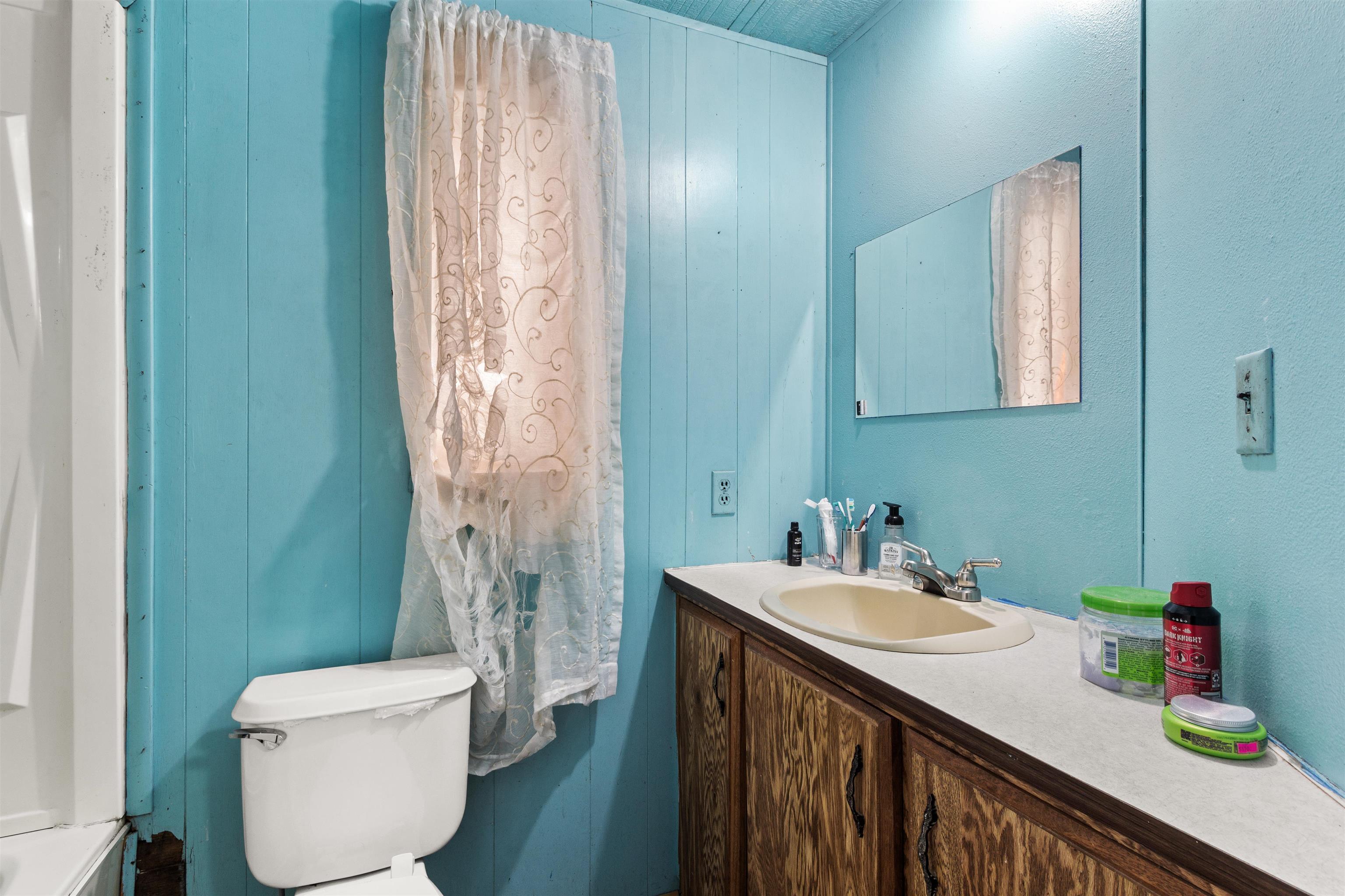 424 32 Road, Unit 262 Clifton, CO 81520 - Photo 10 of 16 a bathroom with a sink a toilet and a mirror