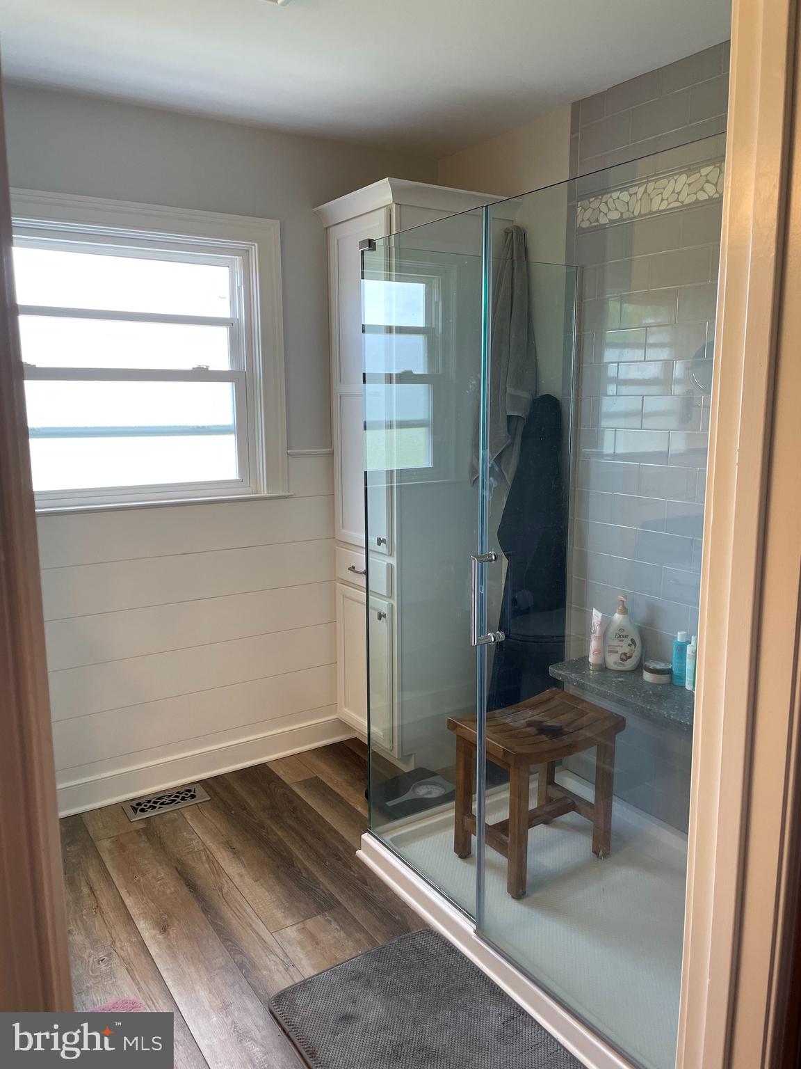 27950 Substation Road Denton, MD 21629 - Photo 30 of 80 Primary Bath w/ Walk-in Shower and Wainscoting