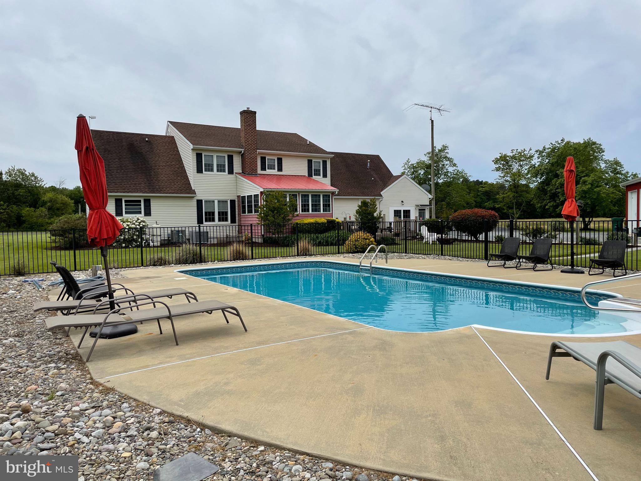 27950 Substation Road Denton, MD 21629 - Photo 73 of 80 Rear of home with saltwater pool,.