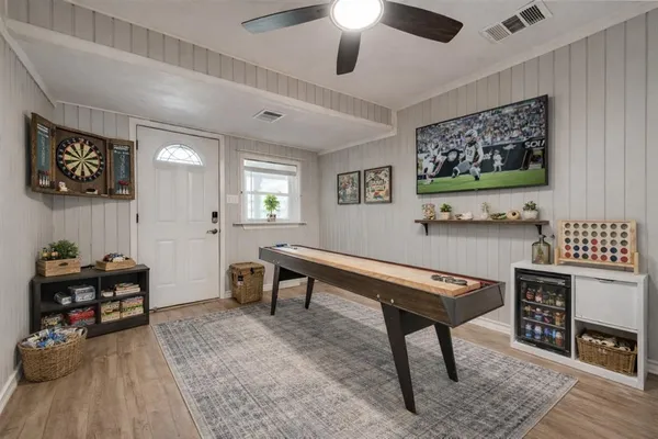 a room with furniture and wooden floor