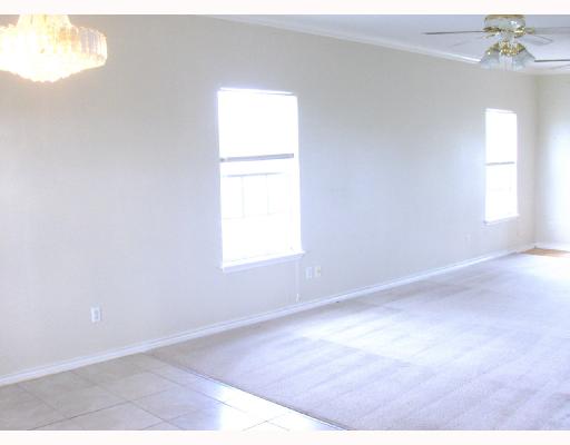 200 Causeway Drive Portland, TX 78374 - Photo 2 of 10 an empty room with a window
