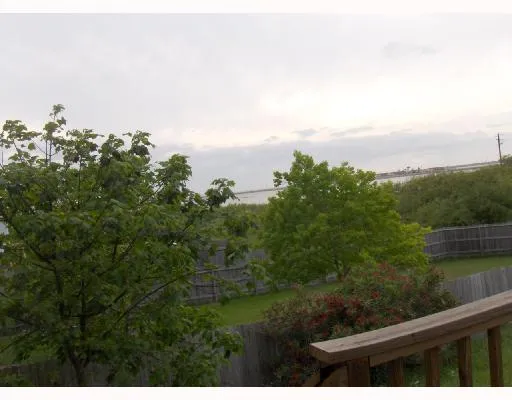 a view of a lake from a balcony