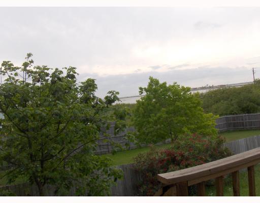 200 Causeway Drive Portland, TX 78374 - Photo 4 of 10 a view of a lake from a balcony