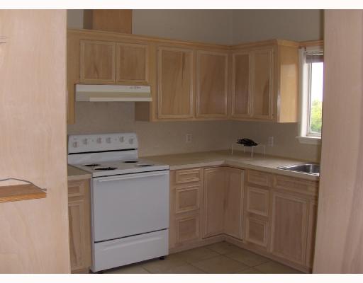 200 Causeway Drive Portland, TX 78374 - Photo 6 of 10 a kitchen with a sink and cabinets