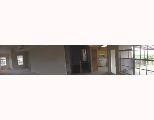 a black and white photo of a house