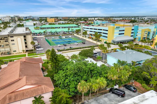an aerial view of residential building and lake view