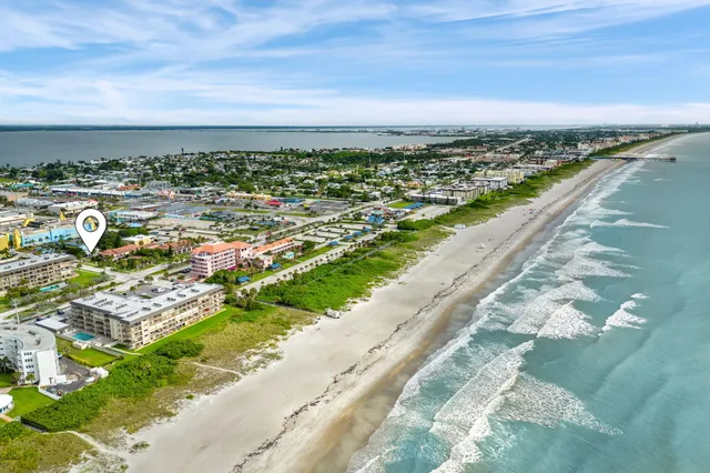 a view of a city with an ocean view