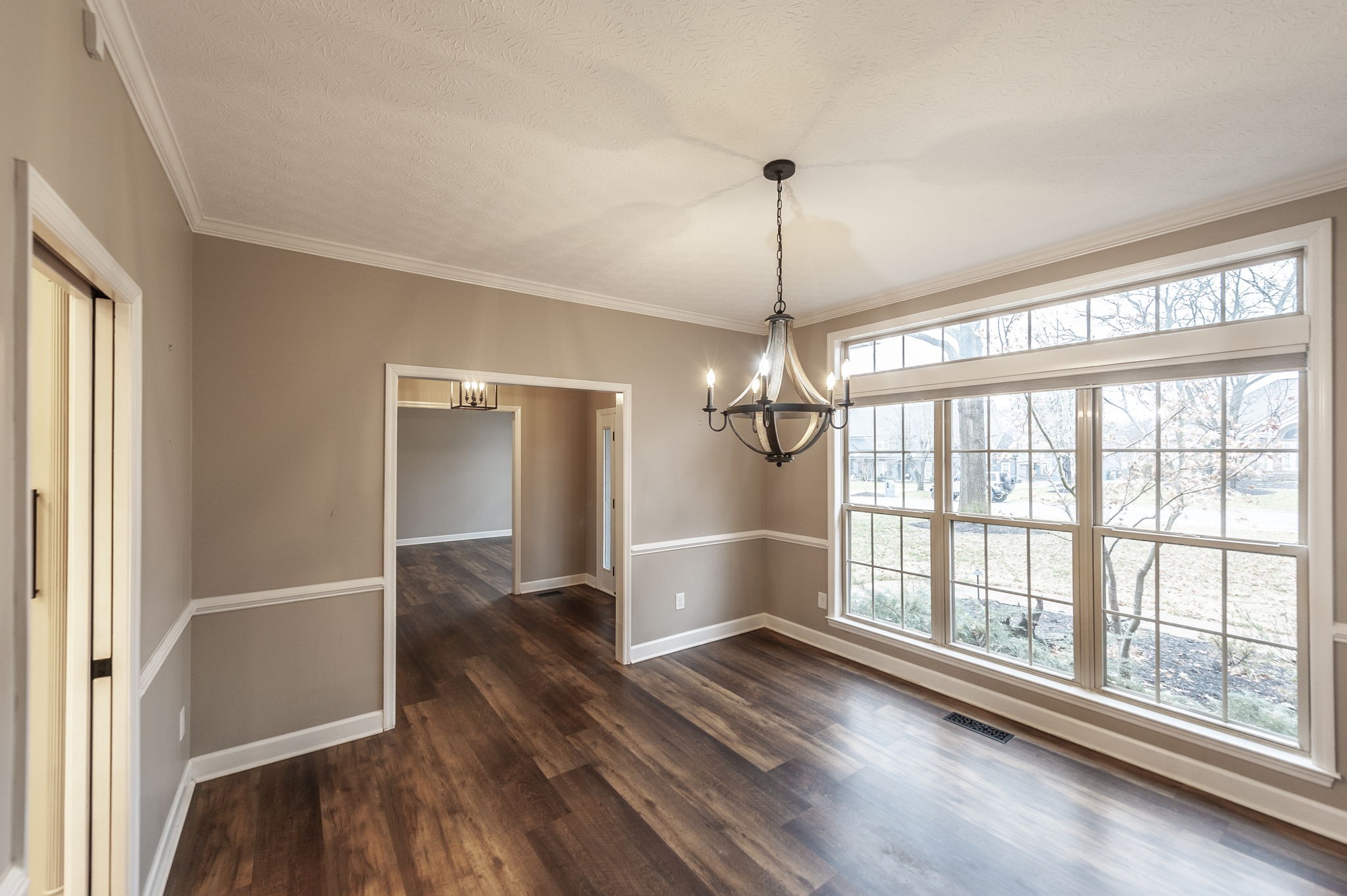 1133 Inneswood Drive Gallatin, TN 37066 - Photo 17 of 57 a view of empty room with wooden floor and fan