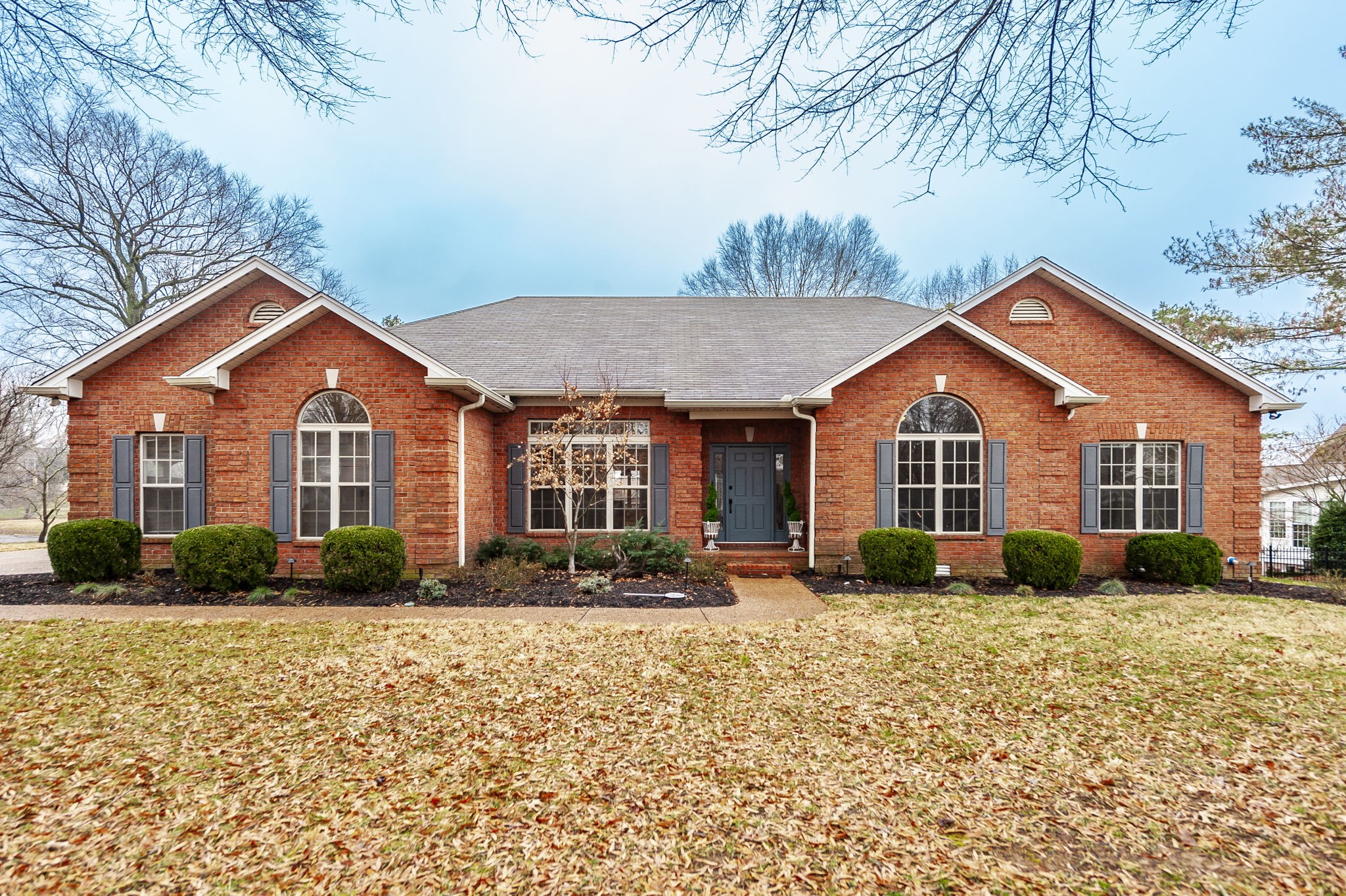 1133 Inneswood Drive Gallatin, TN 37066 - Photo 2 of 57 a front view of a house with garden