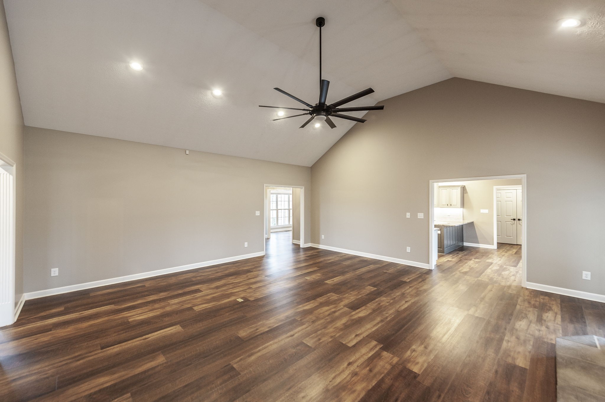 1133 Inneswood Drive Gallatin, TN 37066 - Photo 23 of 57 a view of an empty room with a window and wooden floor