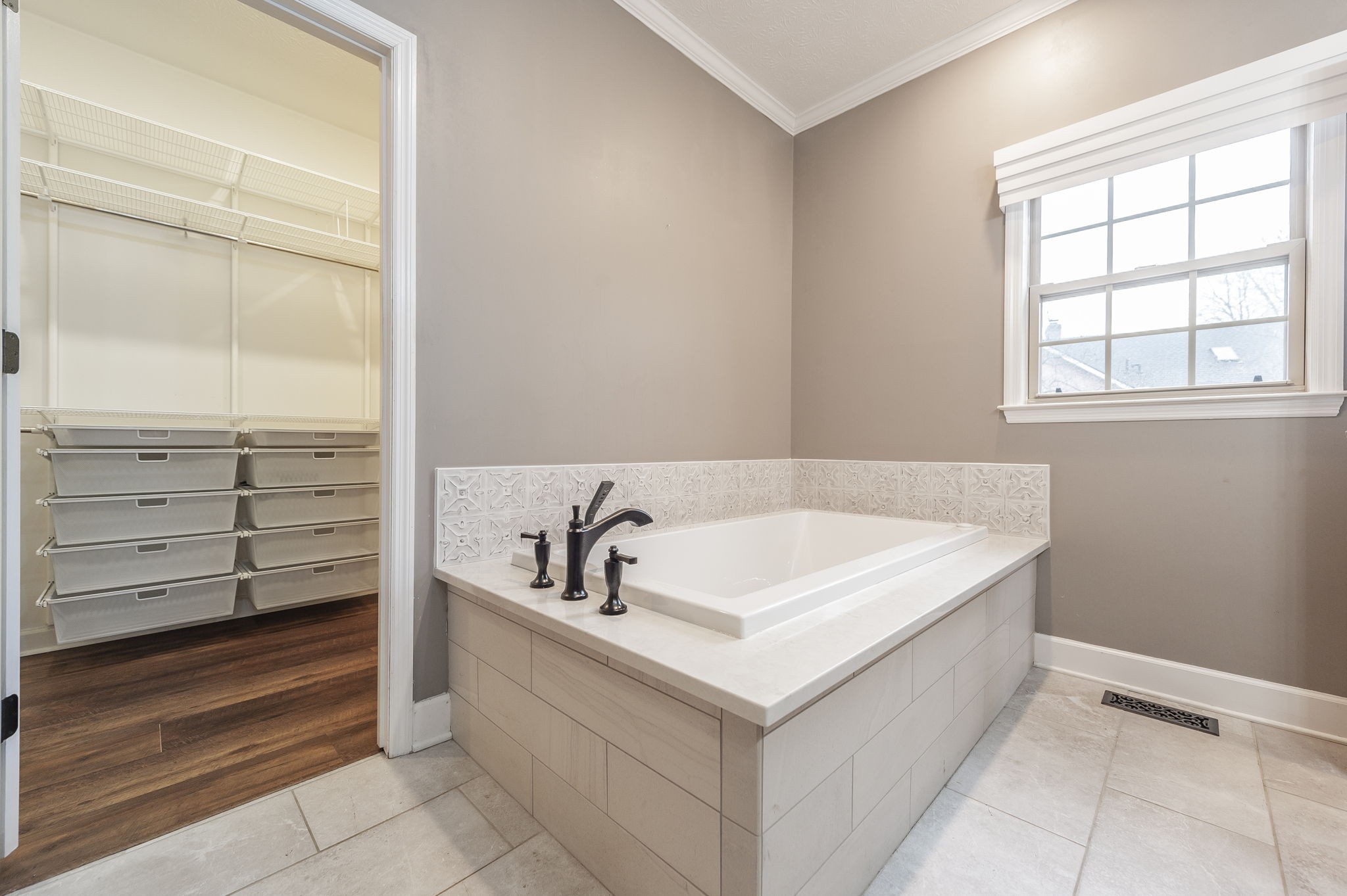 1133 Inneswood Drive Gallatin, TN 37066 - Photo 30 of 57 a bath tub sitting next to a white sink