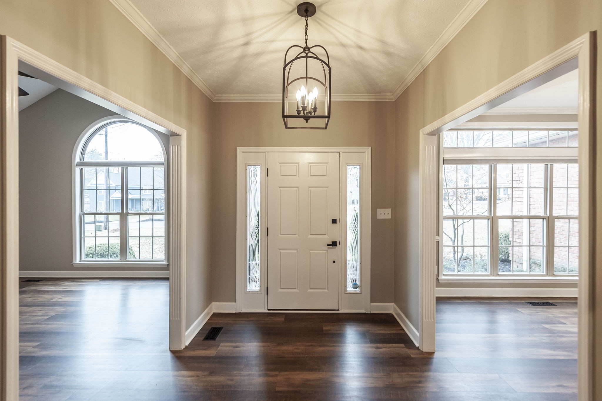 1133 Inneswood Drive Gallatin, TN 37066 - Photo 3 of 57 a view of an entryway with wooden floor and windows