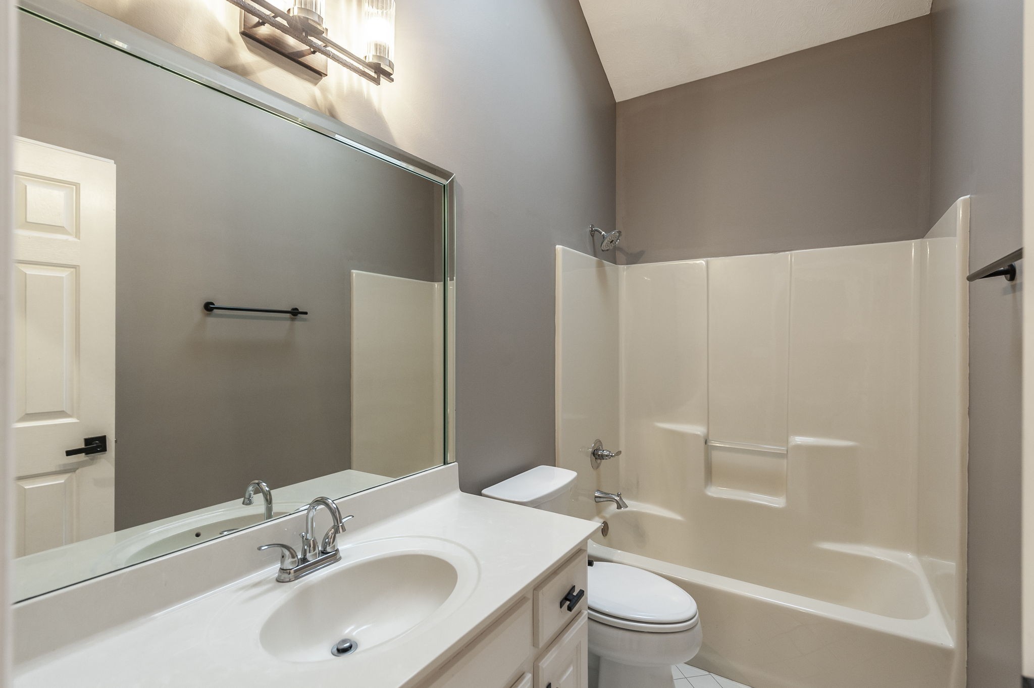 1133 Inneswood Drive Gallatin, TN 37066 - Photo 35 of 57 a bathroom with a sink a toilet and shower