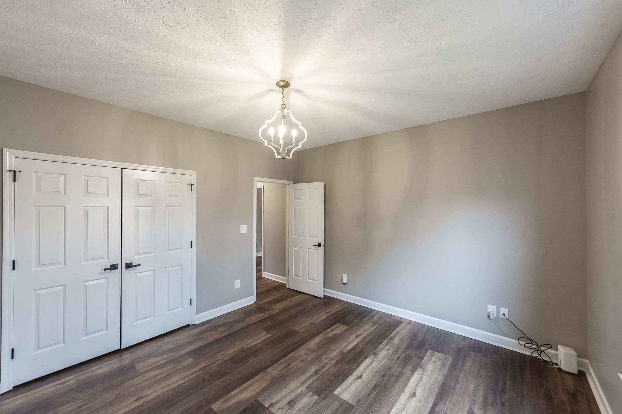 1133 Inneswood Drive Gallatin, TN 37066 - Photo 37 of 57 wooden floor in an empty room with a window