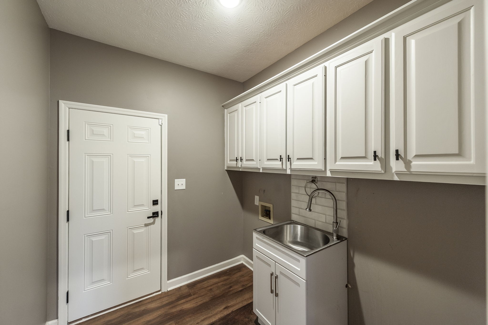 1133 Inneswood Drive Gallatin, TN 37066 - Photo 38 of 57 a kitchen with a sink and a window