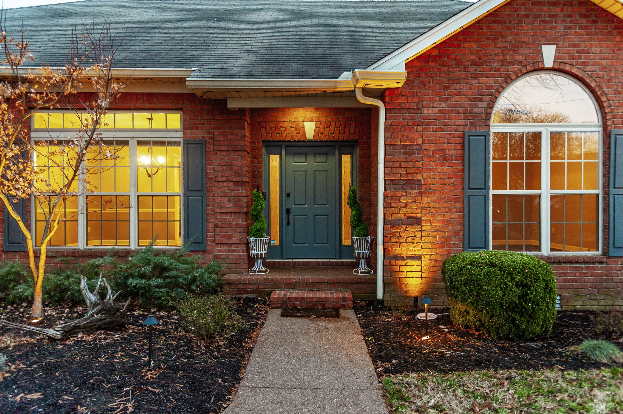 1133 Inneswood Drive Gallatin, TN 37066 - Photo 49 of 57 a front view of a house with a yard