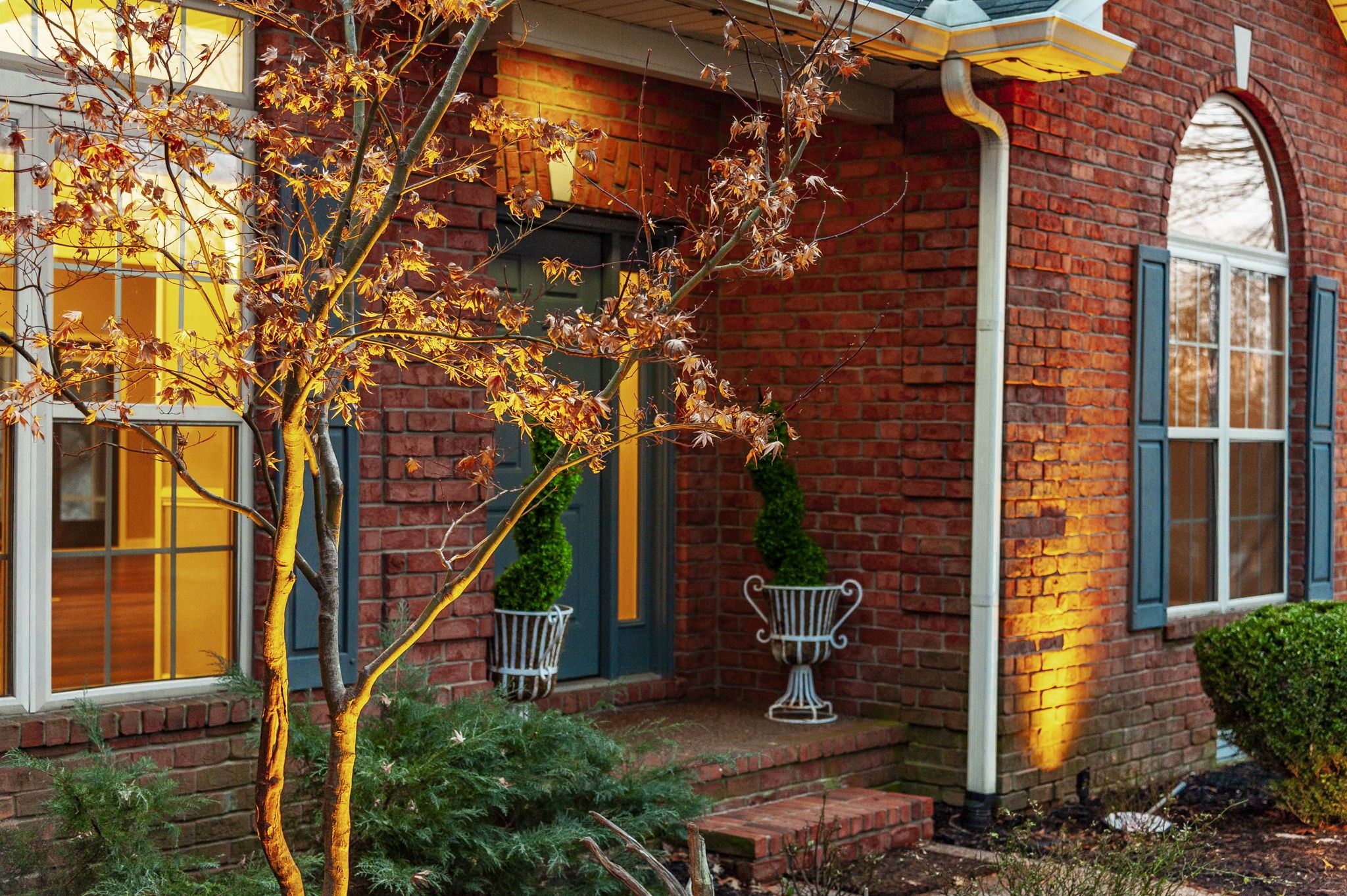 1133 Inneswood Drive Gallatin, TN 37066 - Photo 51 of 57 a view of a house with a tree and wooden fence
