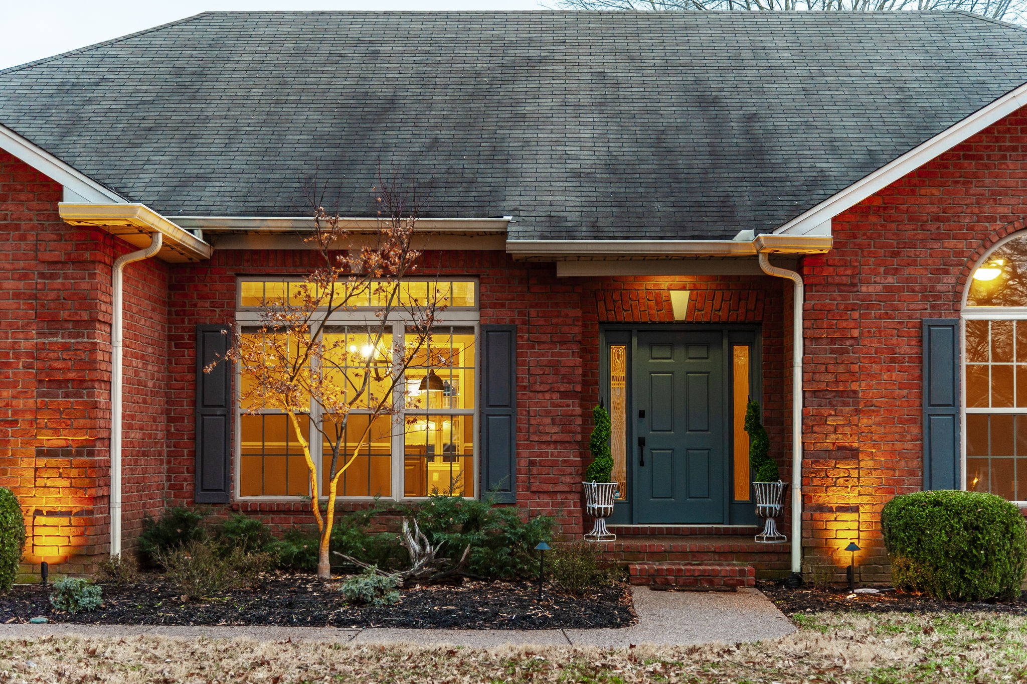 1133 Inneswood Drive Gallatin, TN 37066 - Photo 52 of 57 a front view of a house with a yard