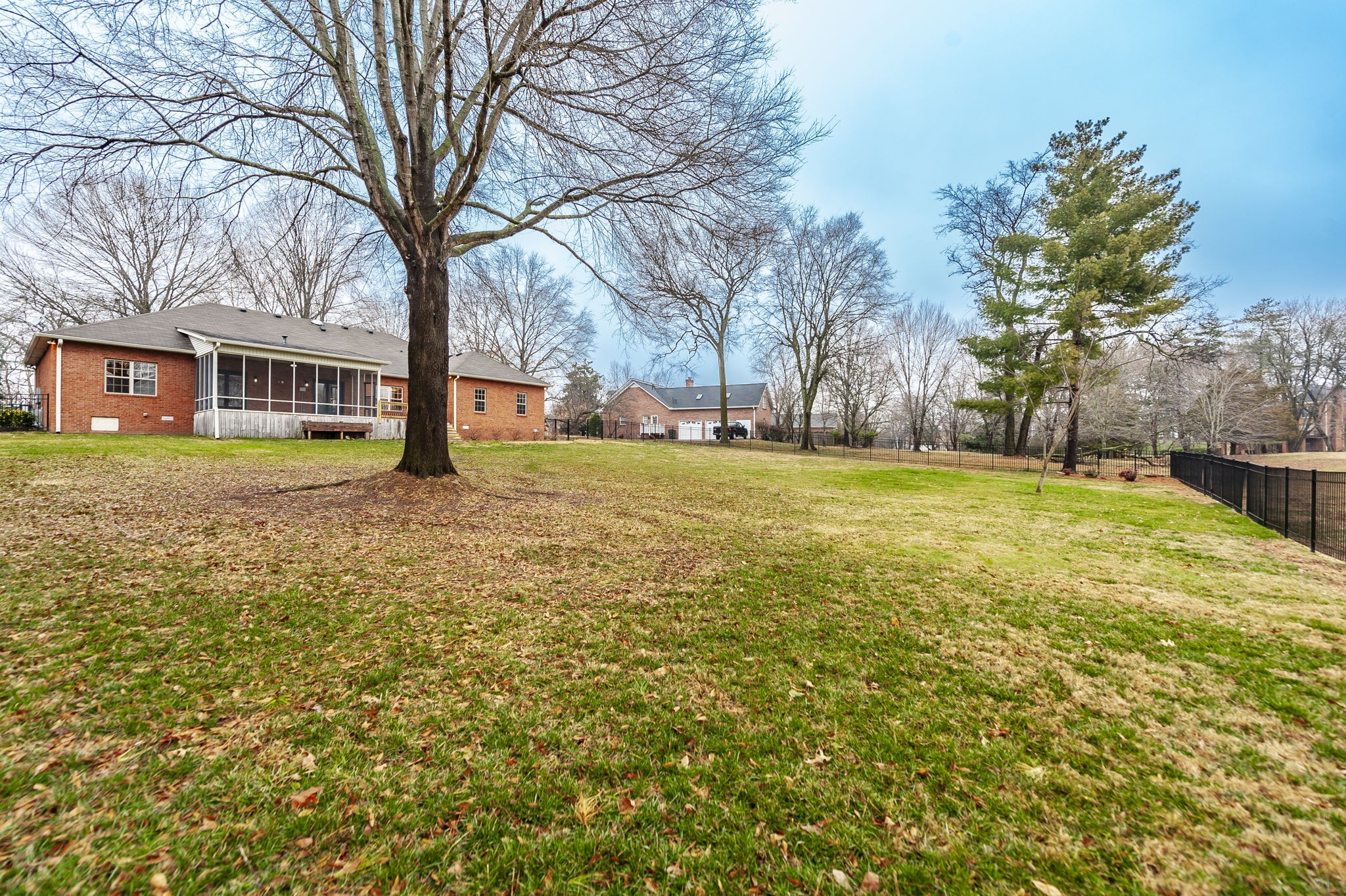 1133 Inneswood Drive Gallatin, TN 37066 - Photo 55 of 57 a view of a yard with a house in the background