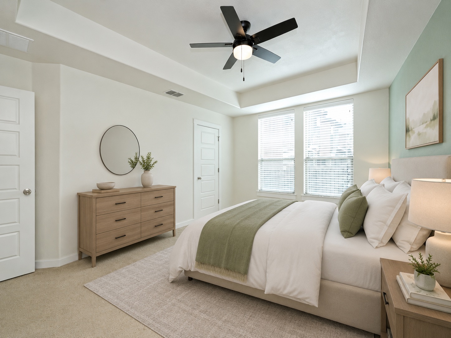 2101 Rivers Edge Way, Unit 29 Austin, TX 78741 - Photo 17 of 38 Virtually Staged. Recessed tray ceiling with a contemporary ceiling fan, large windows with blinds, and neutral carpet flooring