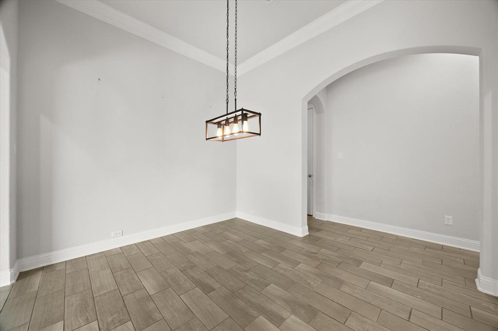 4861 Verbena Way Prosper, TX 75078 - Photo 16 of 38 a view of a room with wooden floor