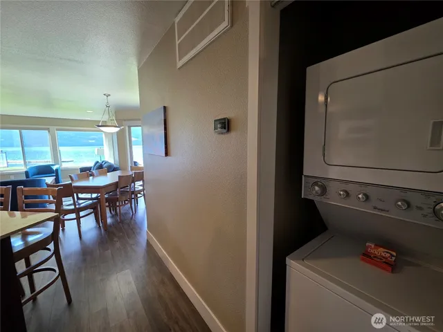 a room with furniture and wooden floor