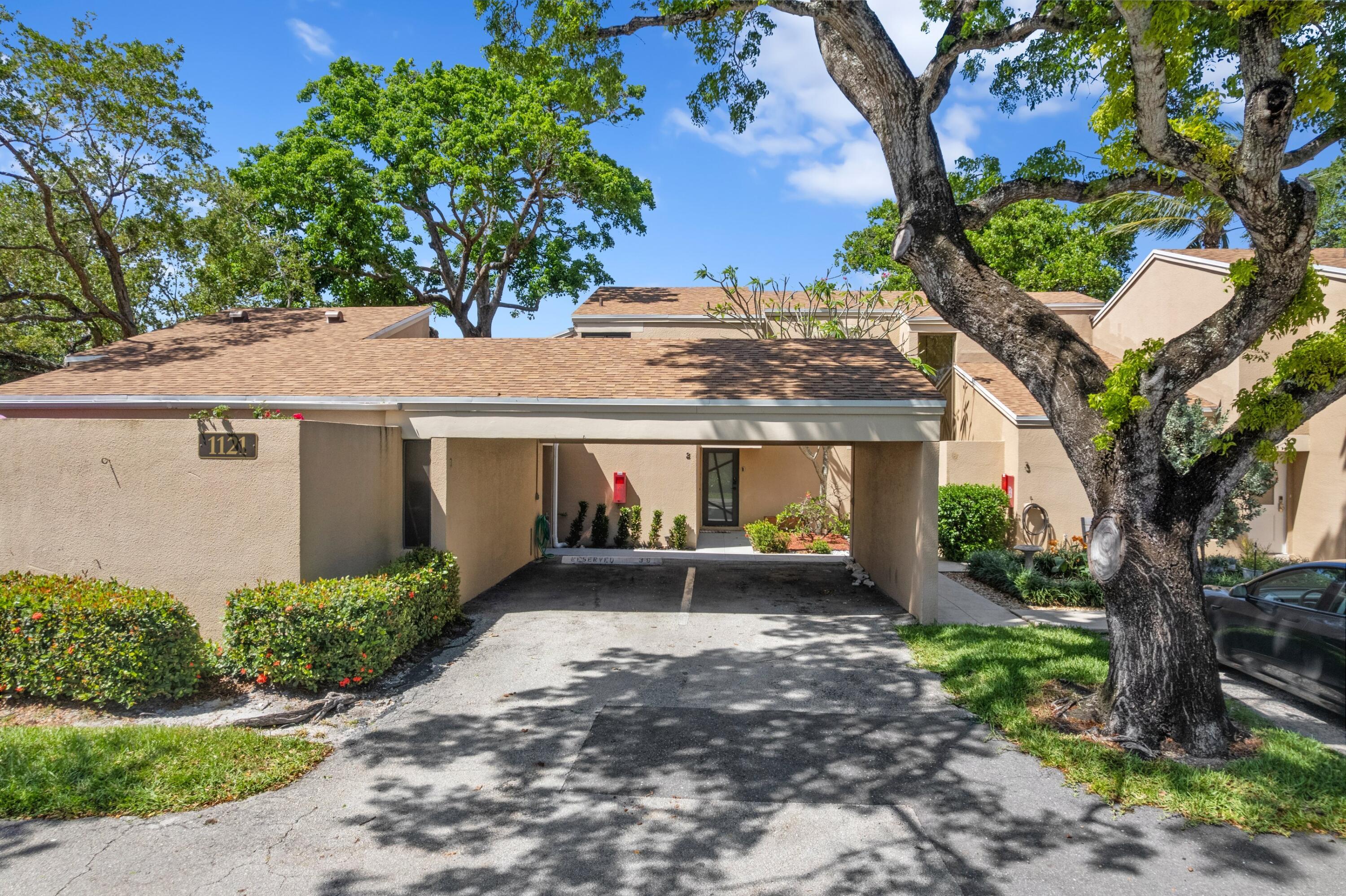 1121 Northwest 13th Street, Unit 3 Boca Raton, FL 33486 - Photo 18 of 37 Main Exterior Photo