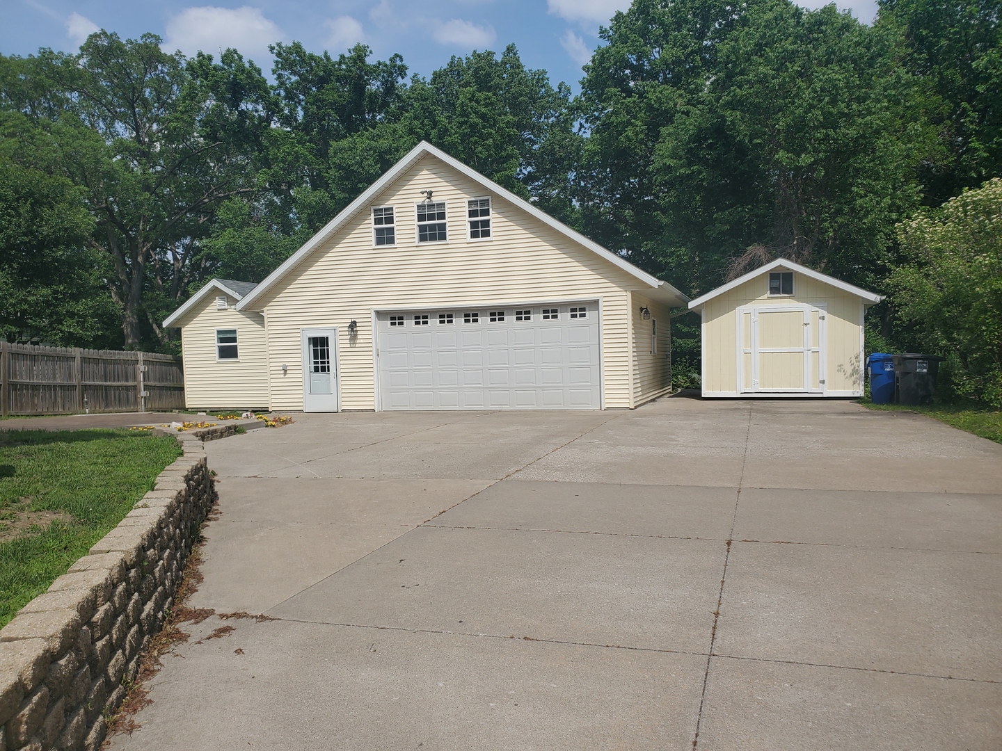 712 3rd Street Moline, IL 61265 - Photo 7 of 29 a view of a house with a yard and large trees