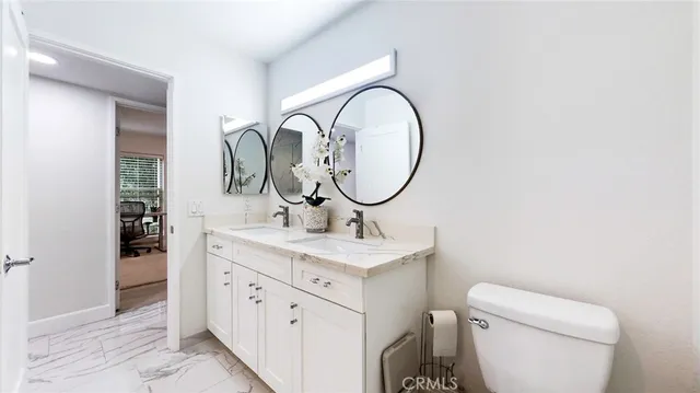 a bathroom with a sink and a shower