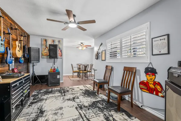 a living room with furniture and a window