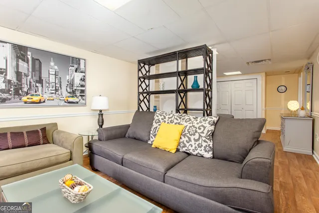 a living room with furniture and a couch